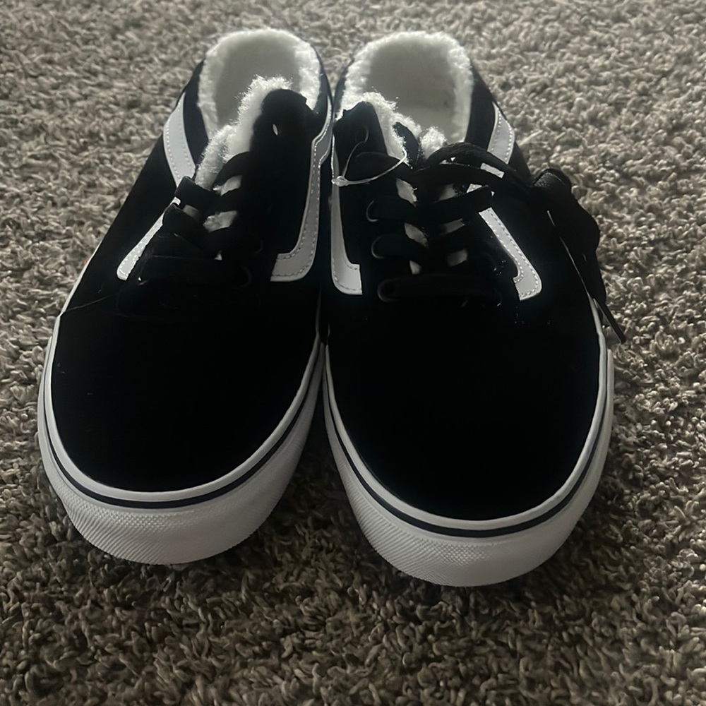 Black slip on vans with Sherpa material